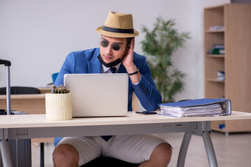 Businessman preparing for trip during pandemic