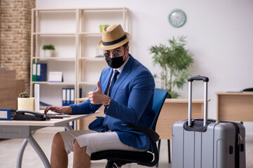 Businessman preparing for trip during pandemic