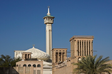 Mosque and wind towers in Bastakia Quarter of Old Dubai, United Arab Emirates