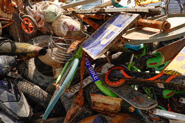 Stockholm, Sweden Trash pulled up from the bottom of Lake Malaren and displayed on a barge, a community project called Rena Malaren.