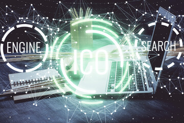 Double exposure of blockchain and crypto economy theme hologram and table with computer background....
