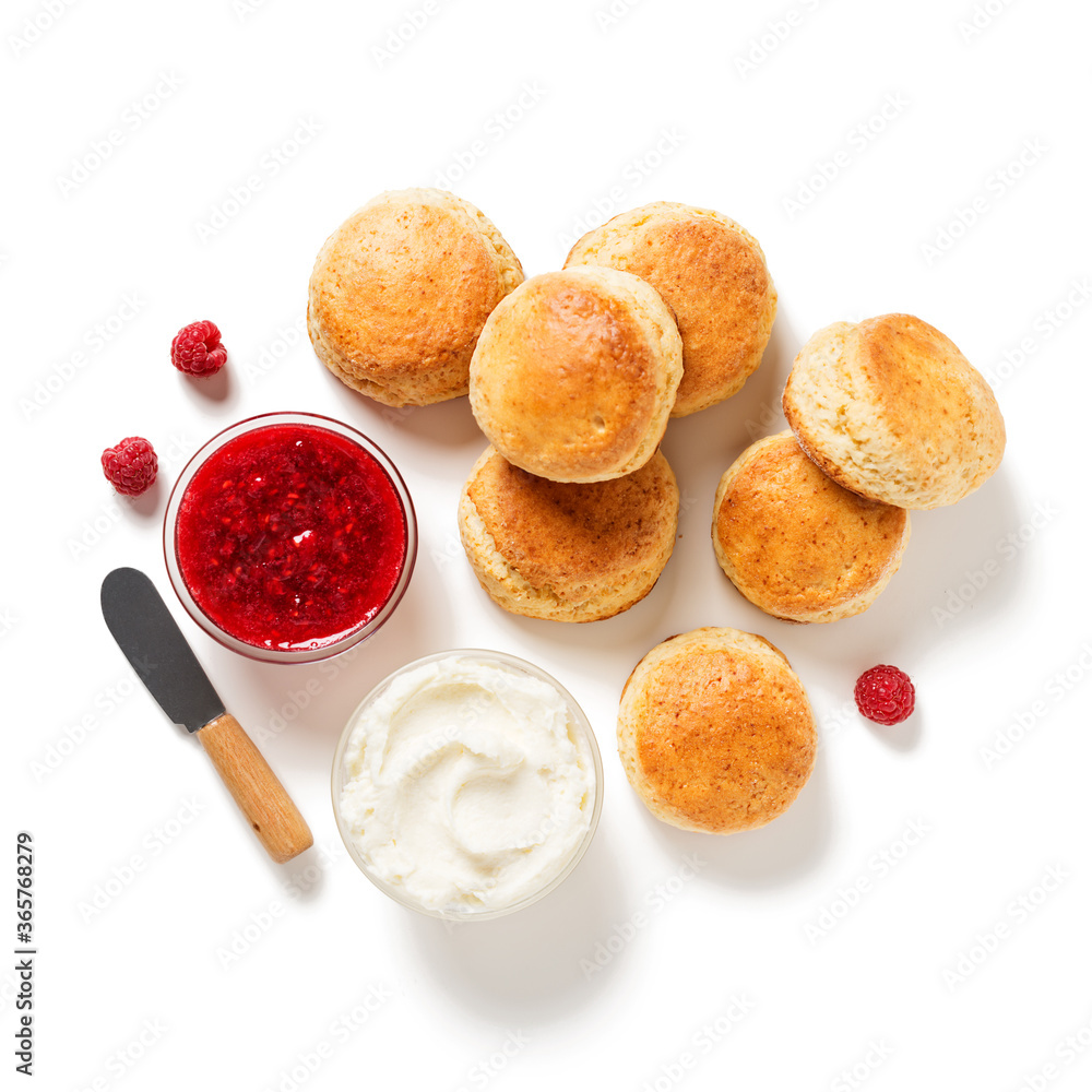 Wall mural scones with raspberry jam and clotted cream. isolated on white background