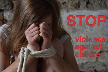 Young girl with tied hands kidnapped, terrified, hostage, afraid. Stop violence against children...