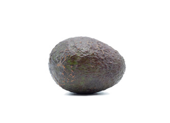 A fresh avocado on white background. Avocado is powerful health benefits fruit with high nutrient value like protein, vitamin and fiber. It can be ingredient in various dishes menu.