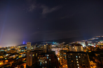 Night sky with stars over Tbilisi's downtown