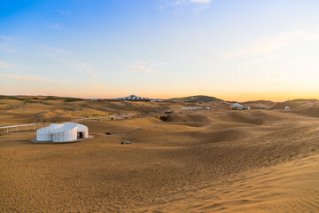 Sunset view of Sand dunes in XiangshaWan, or Singing sand Bay, in hobq or kubuqi desert, Inner Mongolia, China