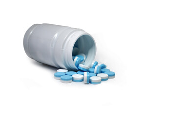 medicine bottle and pills