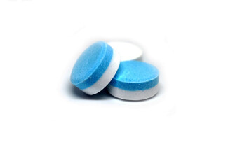 blue pills isolated on white