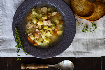 Healthy soup with chicken meat