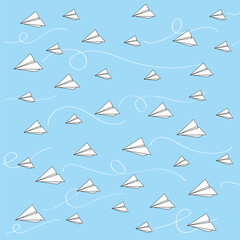 flying paper airplanes on a blue background