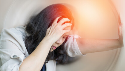 Vertigo illness concept. Woman hands on his head felling headache dizzy sense of spinning...