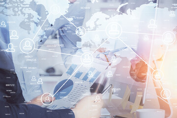 Social network theme hologram with businessman working on computer on background. Multi exposure.