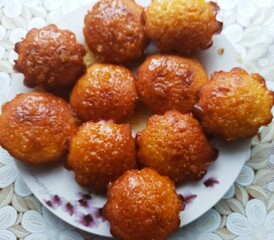 plate with sweet cakes on table