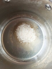 saucepan with lemon juice and sugar