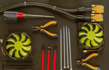 Computer tools and parts on black