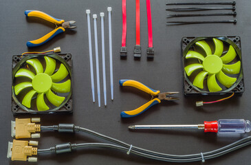 Computer tools and parts on black