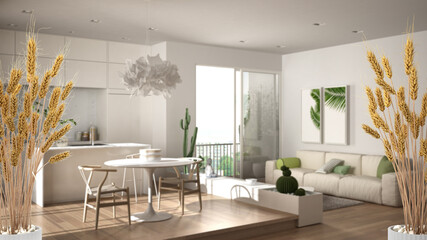 Potted straws with pebbles, dry plants, ornament, ears, sheaf, branch in vase over wooden and white kitchen with accessories, modern minimal interior design