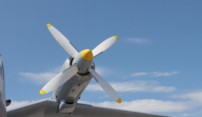 Naklejka na ściany i meble Aircraft propeller engine on the wing.
