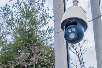 Round black surveillance camera