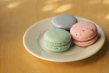 Top view on french macarons in pastel colors