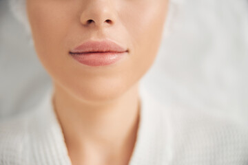 Professional beauty treatment performed for lovely female