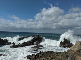 waves crashing on rocks