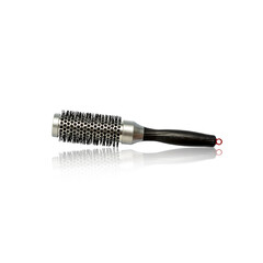 Fototapeta na wymiar Round brush for styling hair with reflection. Isolated on a white background. Hairdressing tools.