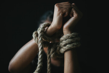Fototapeta na wymiar hands tied with rope