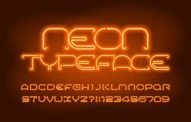 Neon alphabet font. Orange neon light letters and numbers. Blurred background. Stock vector typescript for your design.