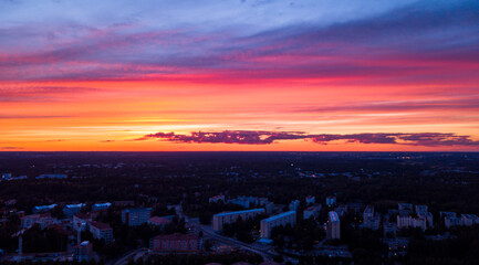Fototapeta na wymiar Aerial city landscape shot. Colorful sunset over the city of Helsinki, Finland, at 11 pm.