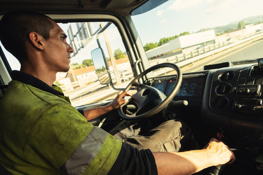 Young truck driver at work