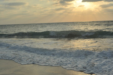 sea sunset wave sky water
