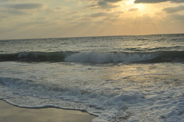 sea sunset wave sky water