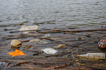 Coronavirus is contributing to pollution, as discarded face masks clutter riverside Danube river along with plastic and other trash. Plastic bottles and other plastic debris float in the Danube River