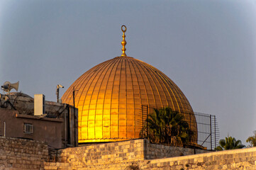 Al-Aqsa Mosque golden dome viewed from the Wailing Wall site in the Old City of Jerusalem in...