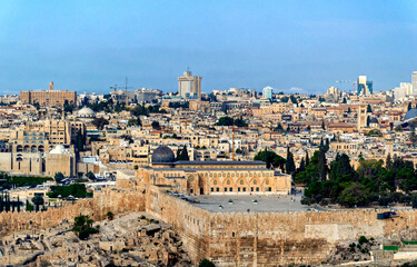 Fototapeta na wymiar Panoramically view over old city of Jerusalem with streets full of vehicles in Jerusalem, Israel.