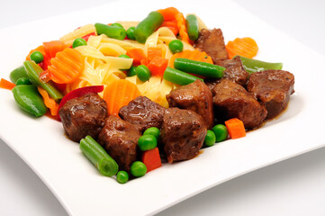 Stew Meat with pasta isolated on white background