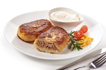 Potato pancakes with meat, isolated on white background