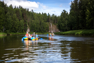 Fototapeta na wymiar rafting on catamarans on the Ural rivers