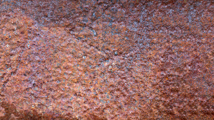 The steel plate is corroded because it is affected by rust.