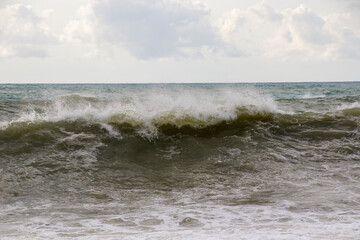 Stormy wheater, waves and splashes in Batumi, Georgia. Stormy Black sea.
