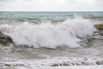 Stormy wheater, waves and splashes in Batumi, Georgia. Stormy Black sea.