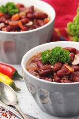 Two bowls with traditional Georgian dish - lobio