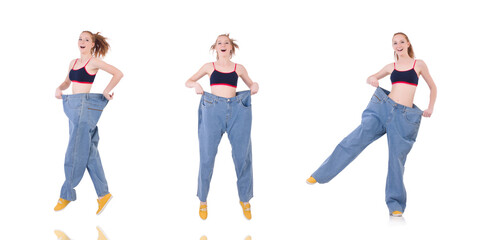 Fototapeta premium Woman with large jeans in dieting concept