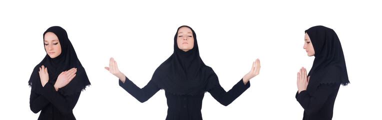 Young muslim woman praying isolated on white