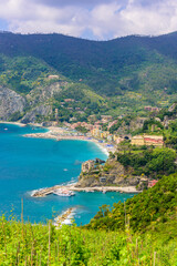 Fototapeta premium Monterosso - Village of Cinque Terre National Park at Coast of Italy. Province of La Spezia, Liguria, in the north of Italy - Travel destination for hiking and attraction in Europe.