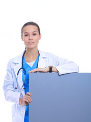 A female doctor with a blank billboard. Woman doctor