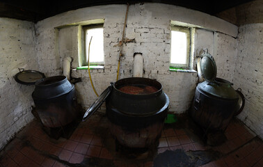Animal shelter kitchen, big tanks with broth for stray dogs prepared