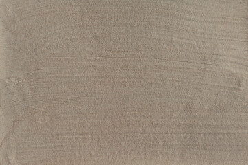 Not accurate stripes on sand of natural beige color
