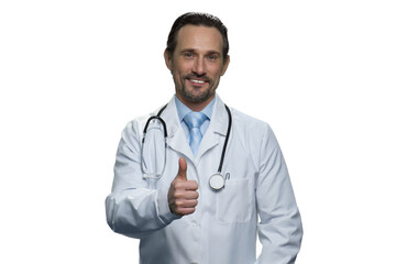 Portrait of american mature doctor giving a thumb up. Caucasian middle-aged doctor with stethoscope isolated on white background.